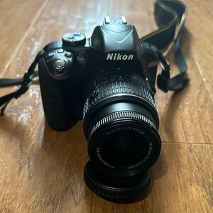Nikon Black DSLR with Lens